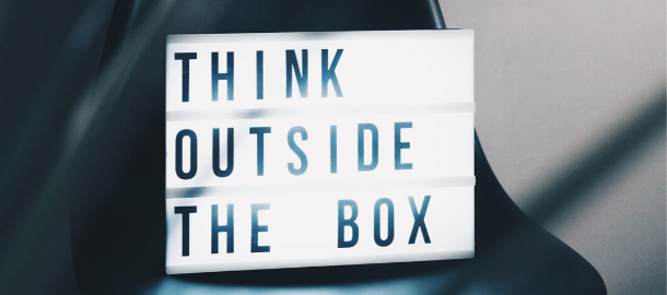 sign that says 'think outside the box'