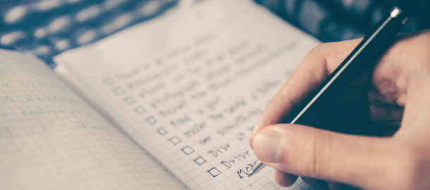 checklist on a grid notebook